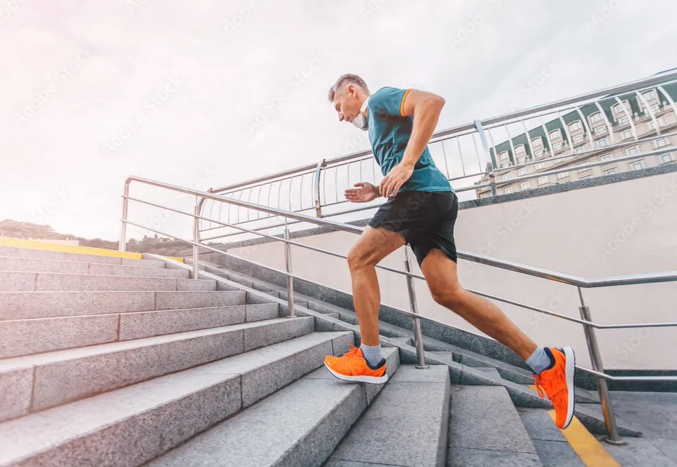 Energetic middle-aged man preparing for a morning workout